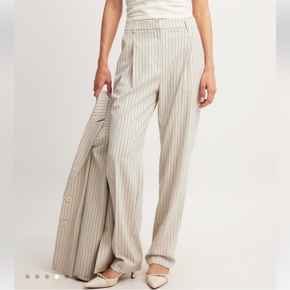 Cream pinstripe trousers